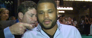 With Anthony Anderson at the R.U.S.H. for Literacy
					Celebrity Billiards Tournament